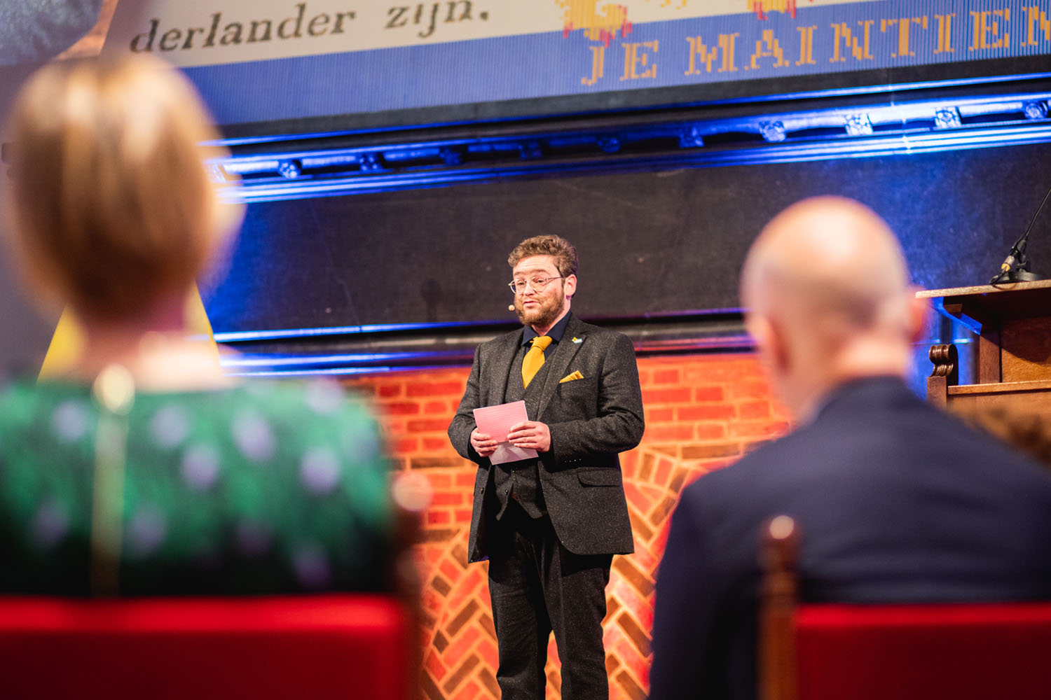 Foto van Brand Berghouwer op het podium in de Ridderzaal