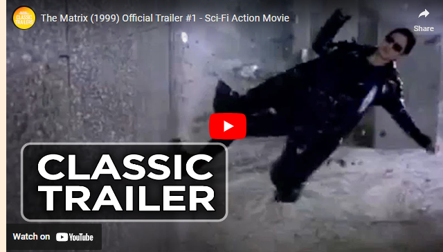 Startscherm van de trailer van The Matrix. Een man in het zwart gekleed is aan het vluchten voor een witte vloeistof waardoor hij bijna wordt opgeslokt.